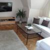 Suite Nr. 3 - Zimmer, Sofa, Tisch, telwizor
