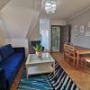 Apartament nr 3 - Pokój gościnny, sofa, stolik