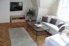 Apartment No. 3 - Guest Room, sofa, table, telwizor