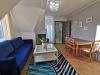 Apartament nr 3 - Pokój gościnny, sofa, stolik